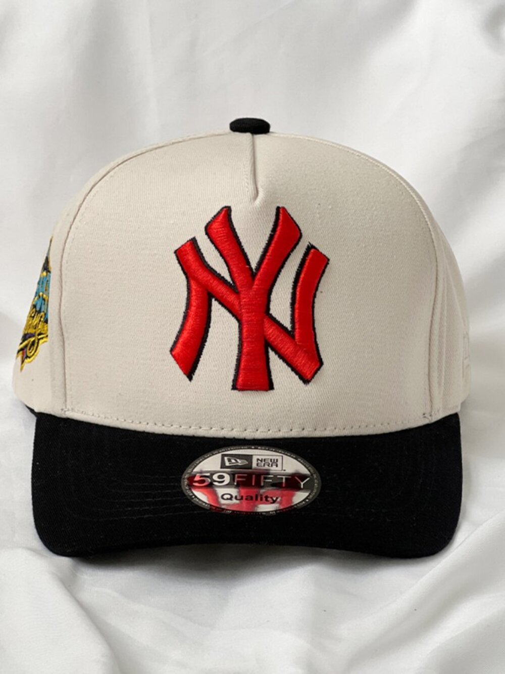 NY red text New era cap
